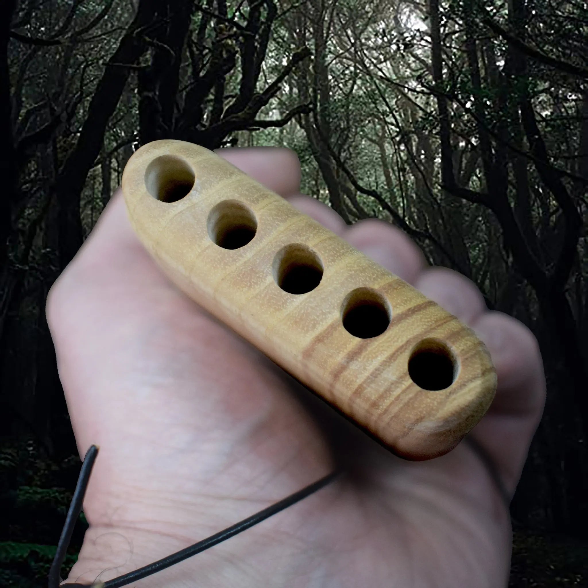 Reproduction of the Original Pan Flute / Pan Pipes Found at Jorvik, 9th / 10th Century in Hand - Holes View