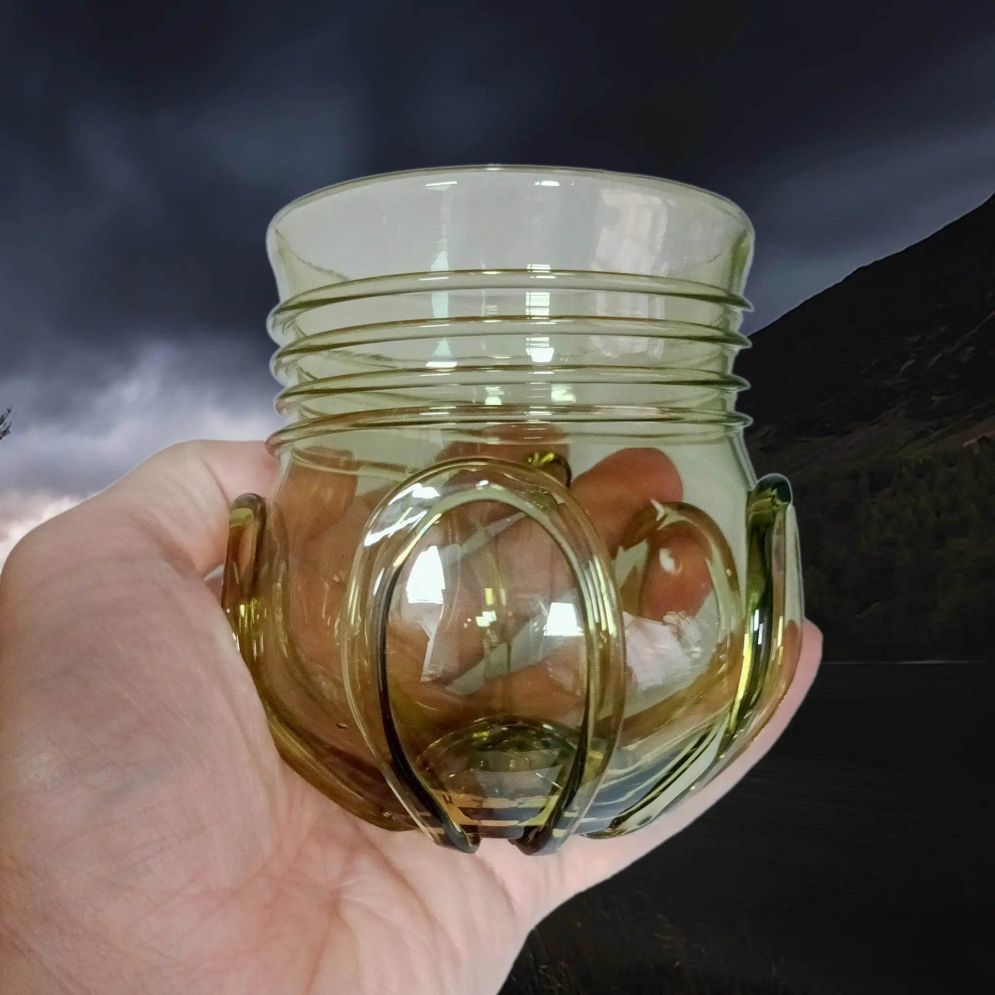 Handmade Round Viking Glass From Birka in Hand Aloft