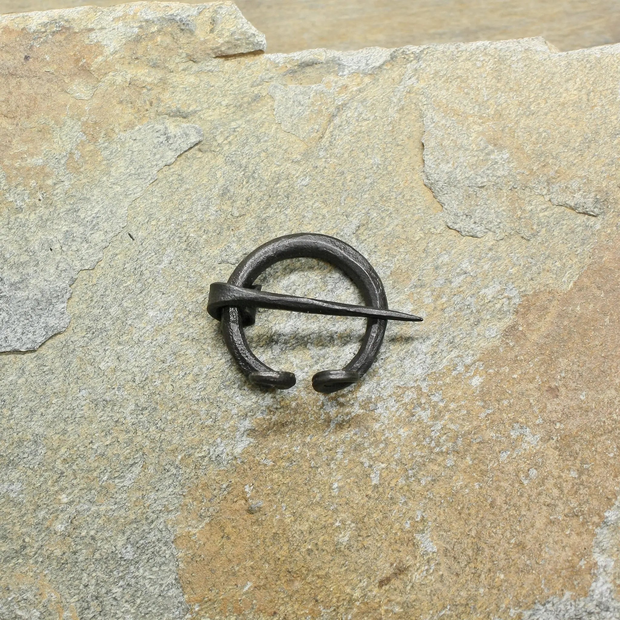 20mm Plain Iron Penannular Brooch / Cloak Pin on Rock