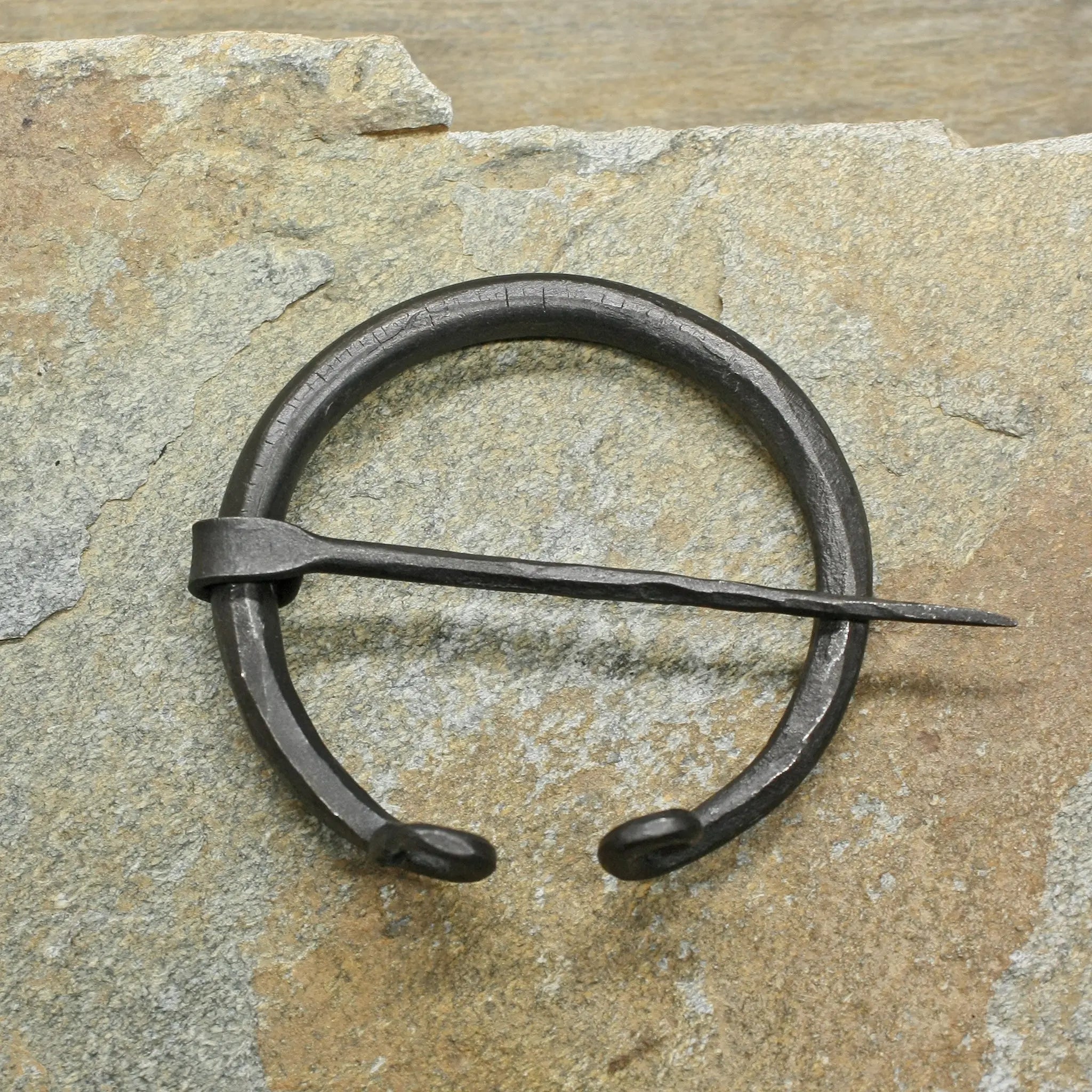 60mm Plain Iron Penannular Brooch / Cloak Pin on Rock