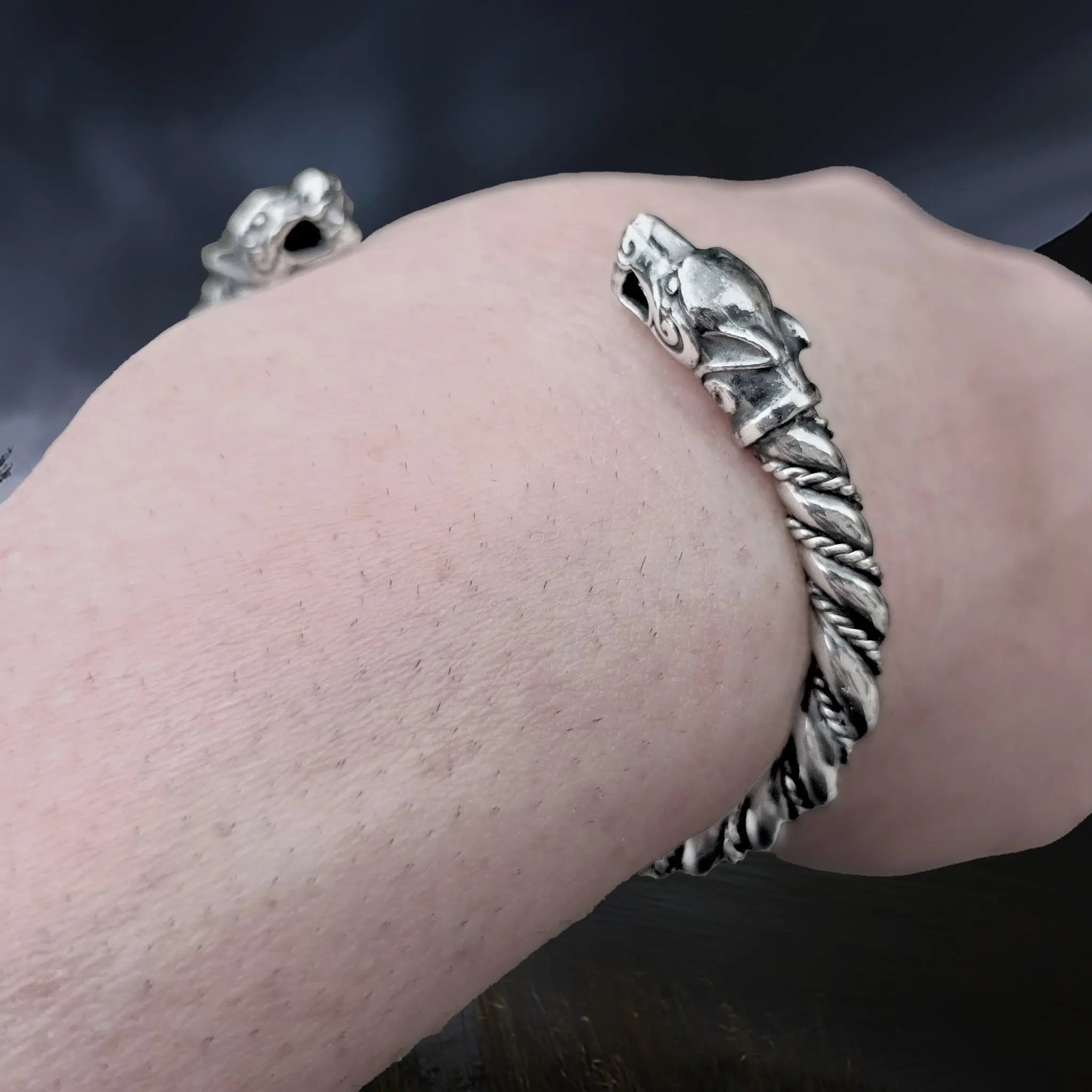 Twisted Silver Viking Bracelet / Arm Ring With Ferocious Wolf Heads on Wrist - Close Up Angle View