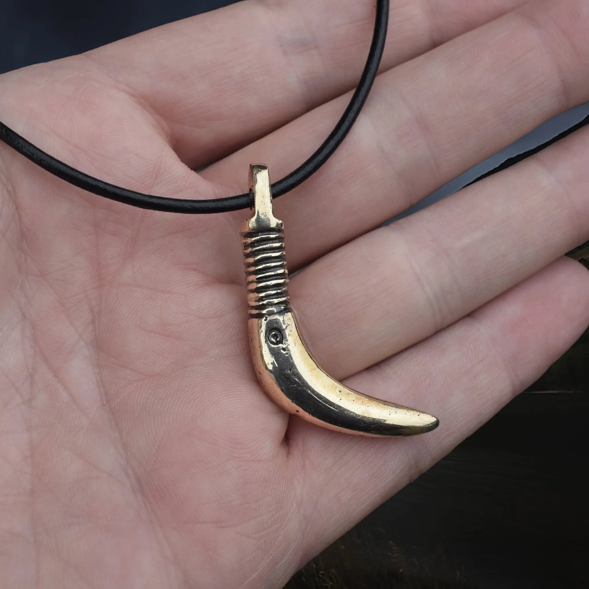 Solid Bronze Replica Viking Bear Tooth Pendant from 9th to 11th century Finland on Leather Cord, on Hand