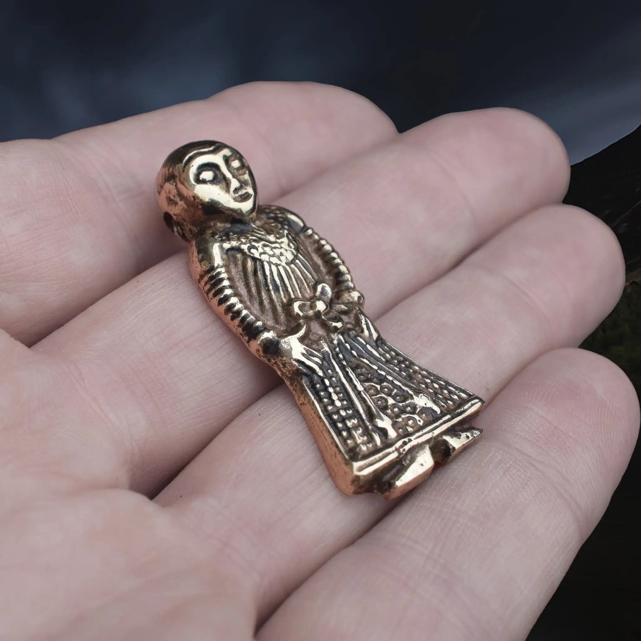 Large Bronze Viking Woman Pendant Replica from Revninge, Denmark on Hand - Front Angle View