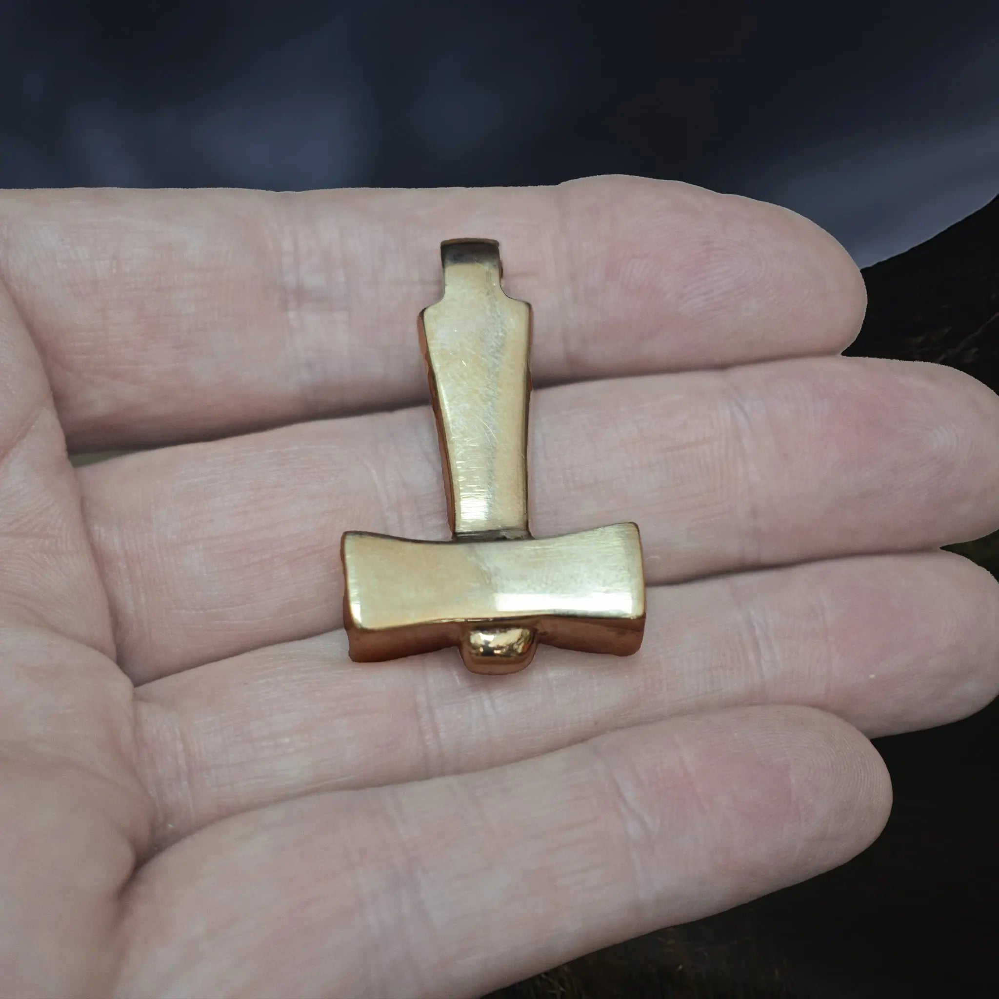Bronze Replica Thors Hammer Pendant from Läby, Sweden on Hand 