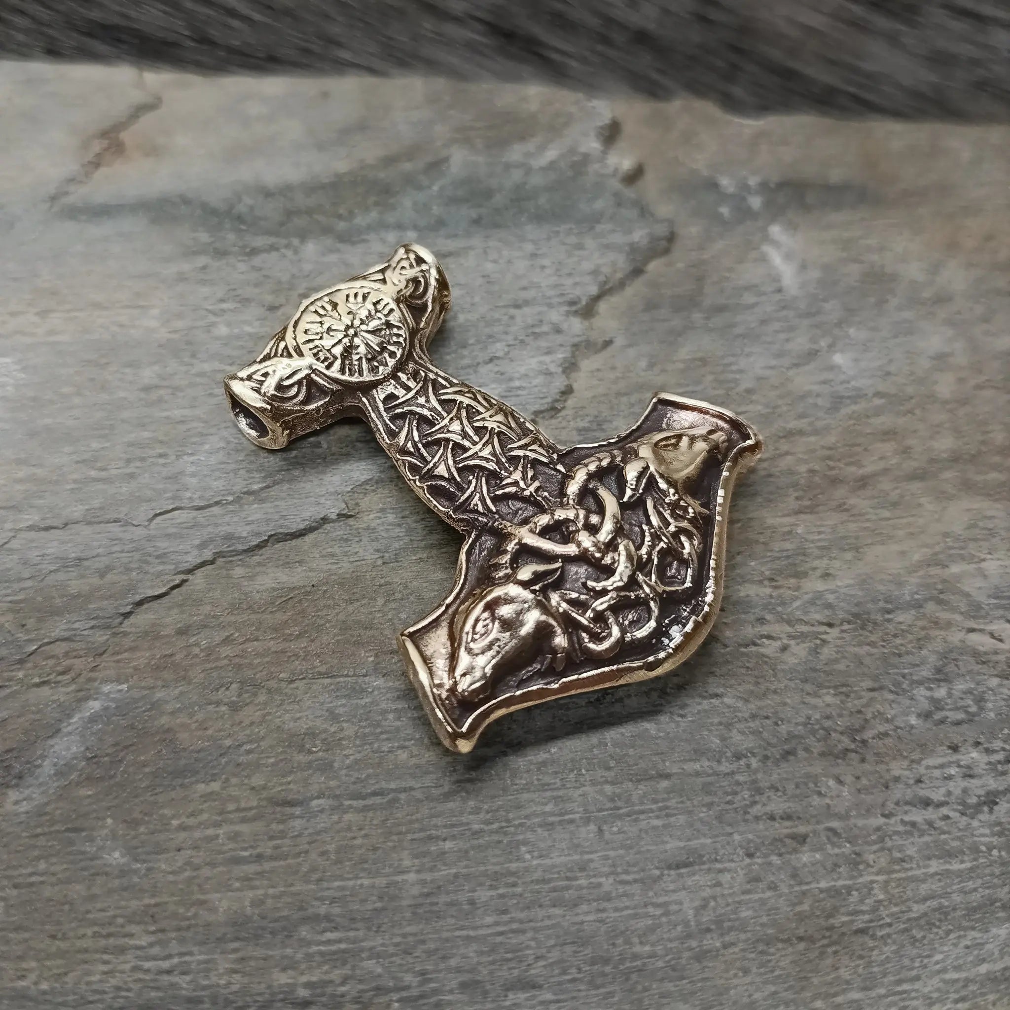 Bronze Goat Thors Hammer Pendant on Rock - Angle View